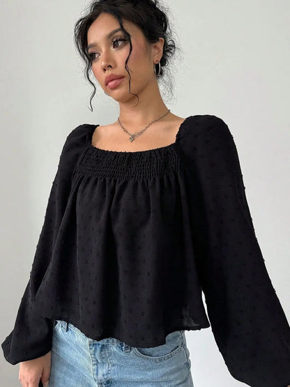 Blusa de manga larga con escote cuadrado y lunares suizos