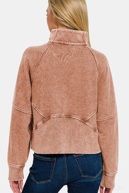 Back view of a woman wearing a Zenana acid washed half zip fleece sweatshirt in brown with ribbed cuffs and hem