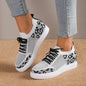 Zapatillas planas con cordones y estampado de leopardo