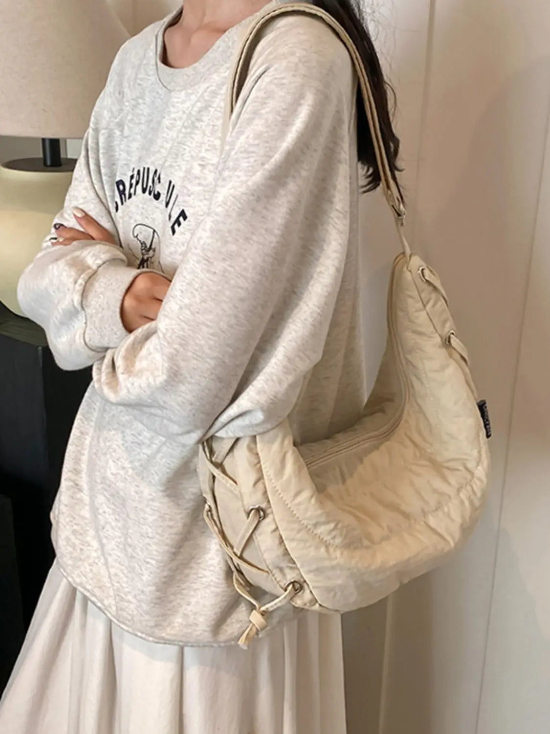 Bolso bandolera de poliéster con cordones